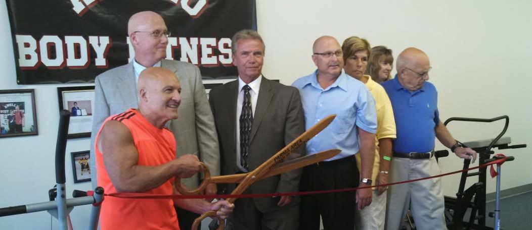 Powerlifting Legend Vince Anello with Parma Heights Mayor Mike Byrne at the ribbon-cutting ceremony for Anello Body Fitness.